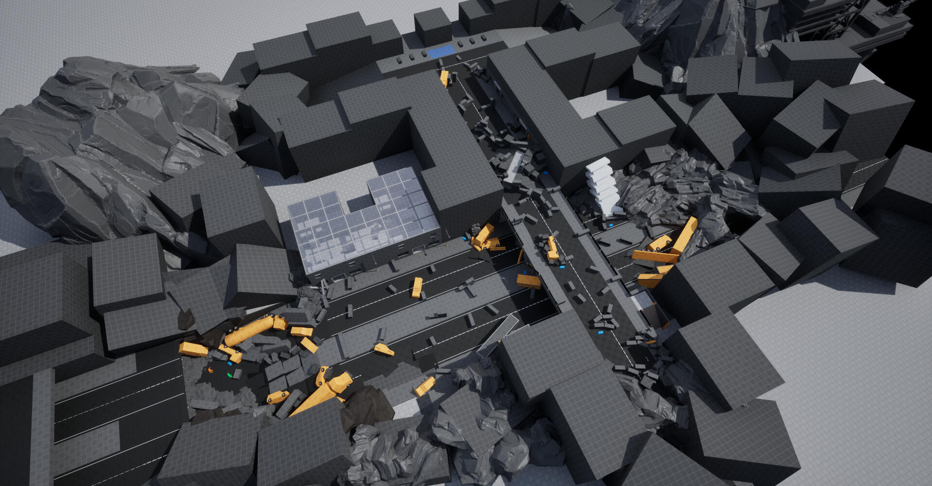 Top-down view. A wide road in the city leads the players up onto a bridge.